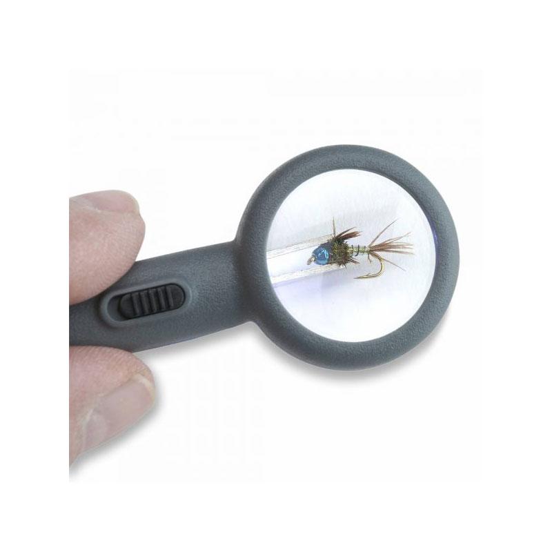 Carson Fish’n’Grip Pro 4.5x Hand Magnifier with Reverse Action Tweezers, Magnetic Hook Cleaner and Line Cutter in use
