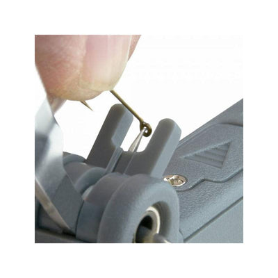 Carson Fish’n’Grip Pro 4.5x Hand Magnifier with Reverse Action Tweezers, Magnetic Hook Cleaner and Line Cutter in use