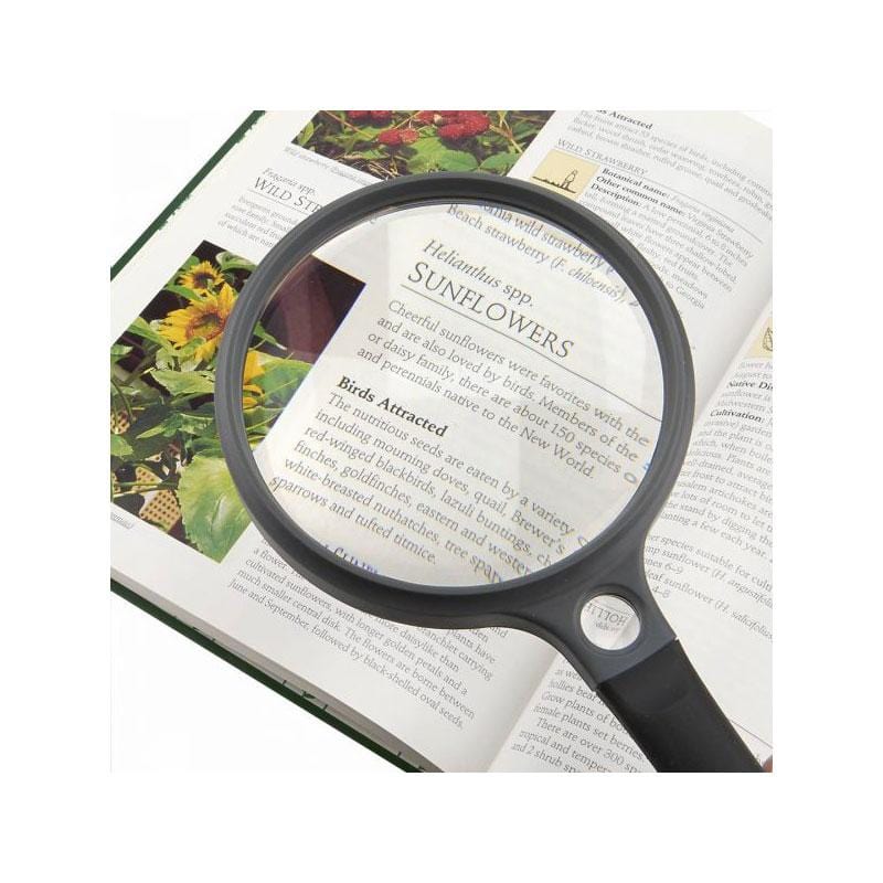 Carson SureGrip SG-12 2x Hand Magnifier with 11.5x Spot Lens - Medium in use