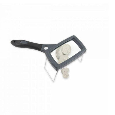 Carson SureGrip 2x Hand Magnifier with 10x Spot Lens and Stand in use